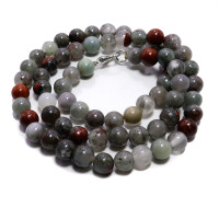 Бусы из камня Яшма кровавая серая дарует защиту от порчи и убирает блоки с денежного канала