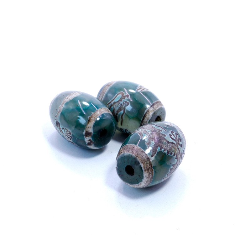 Бусина Дзи уп-2шт с Драконом символизирует защиту и приумножение богатства