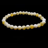 Браслет каменный Желтый Опал способен противостоять магии, колдовской порче и стихийных бедствий 6мм